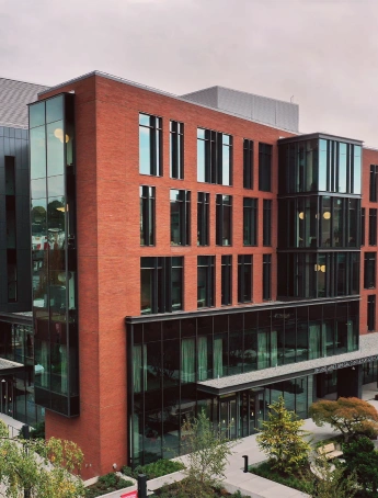 Stack of books with mortarboard
