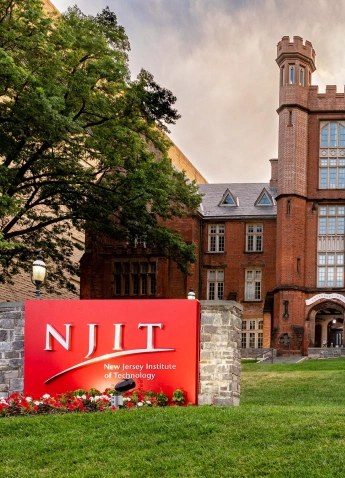 Stack of books with mortarboard