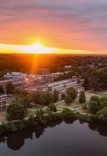 Stack of books with mortarboard