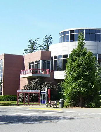 Stack of books with mortarboard
