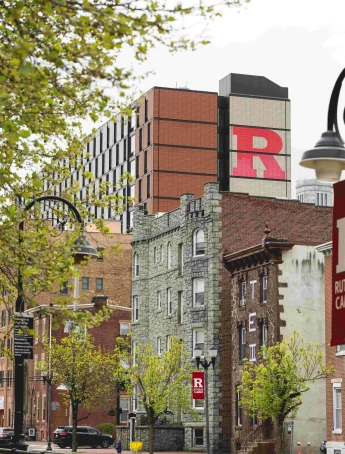 Stack of books with mortarboard