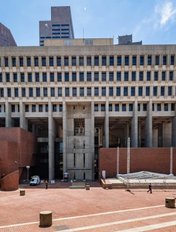 Stack of books with mortarboard