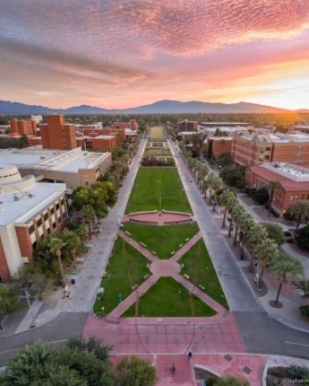 Stack of books with mortarboard