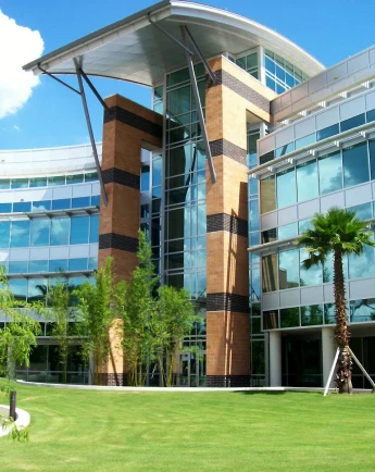 Stack of books with mortarboard