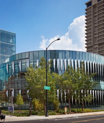 Stack of books with mortarboard