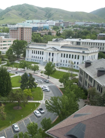 Stack of books with mortarboard