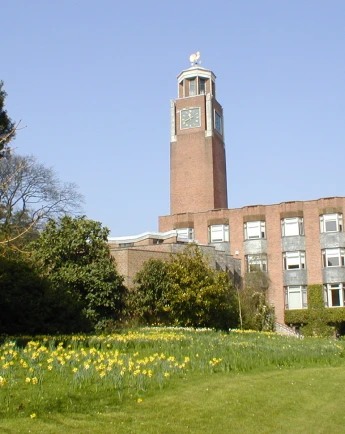 Stack of books with mortarboard