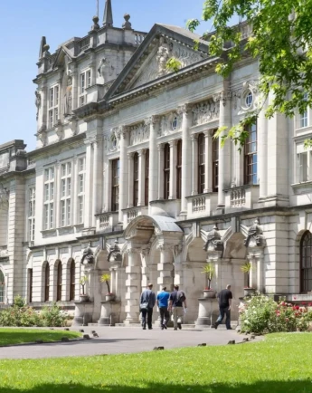 Stack of books with mortarboard