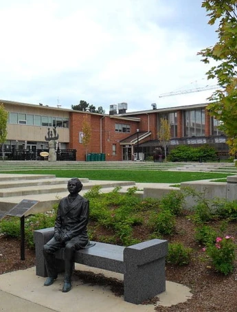 Stack of books with mortarboard